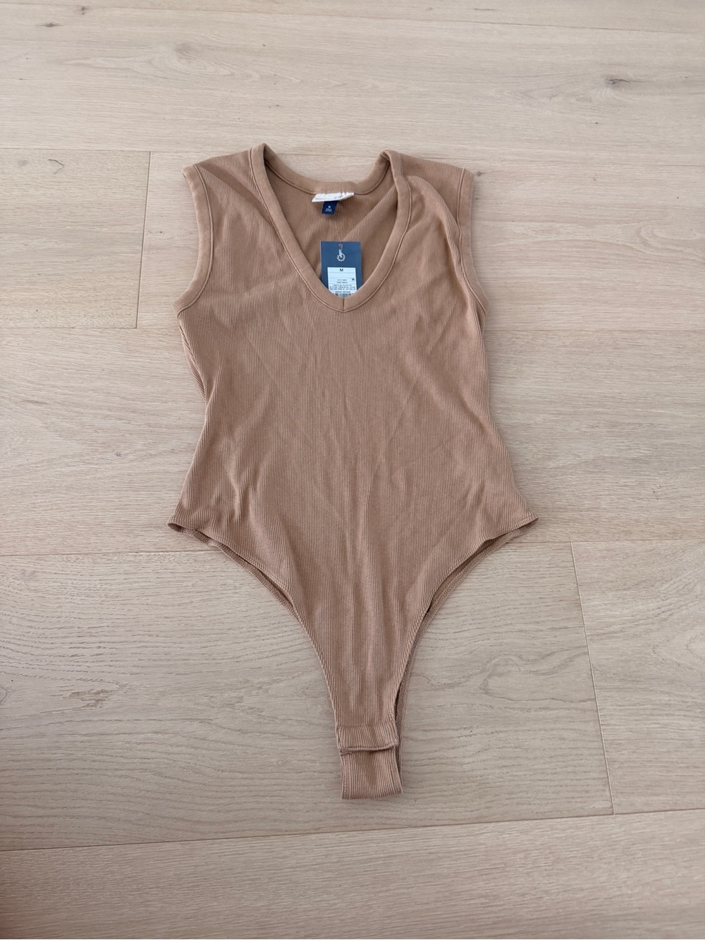 Universal Thread Sleeveless Ribbed V-Neck Bodysuit in Camel Brown